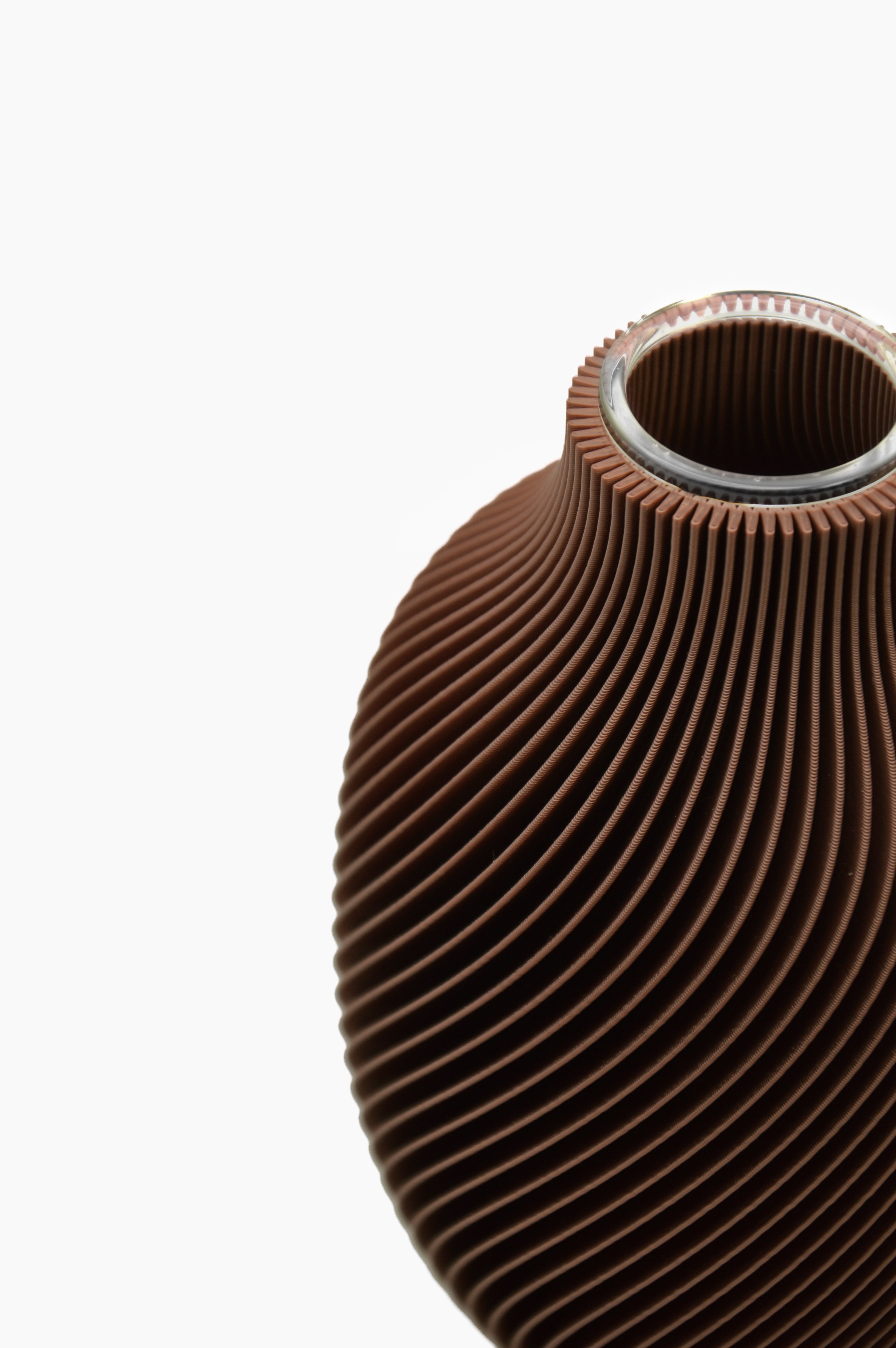 Diffusore Eolia · marrone cioccolato · vista dall'alto · design 3D spirale · ricaricabile · Made in Italy · Yliaca