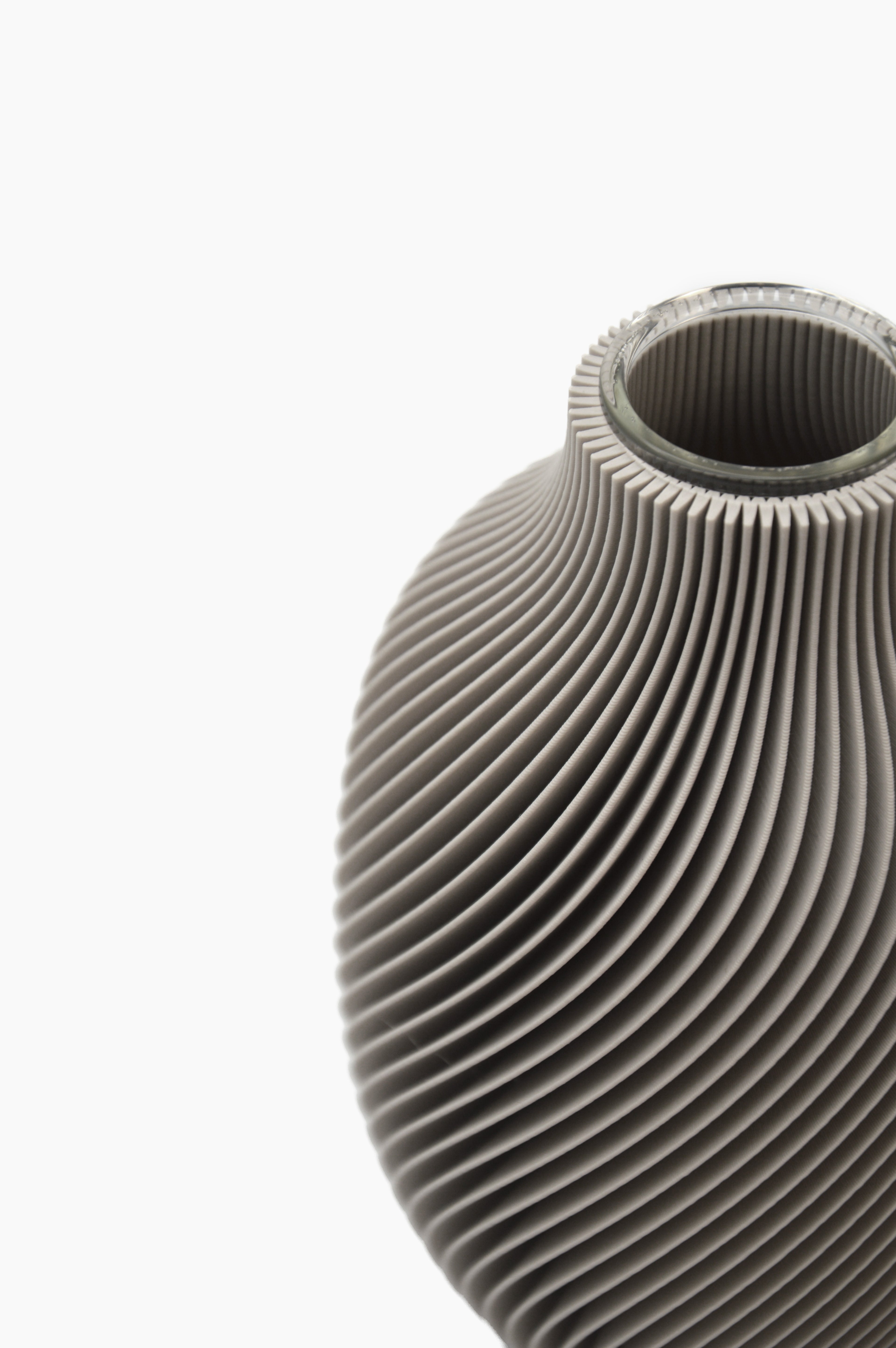 Diffusore Eolia · tortora · vista dall'alto · design 3D spirale · ricaricabile · Made in Italy · Yliaca